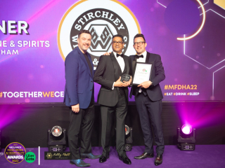 Midlands Food Drink & Hospitality Awards 2022 Krishan collecting the award for "Best Drinks Merchant & Tasting House of the Year" at the Midlands Food Drink & Hospitality Awards 2022.